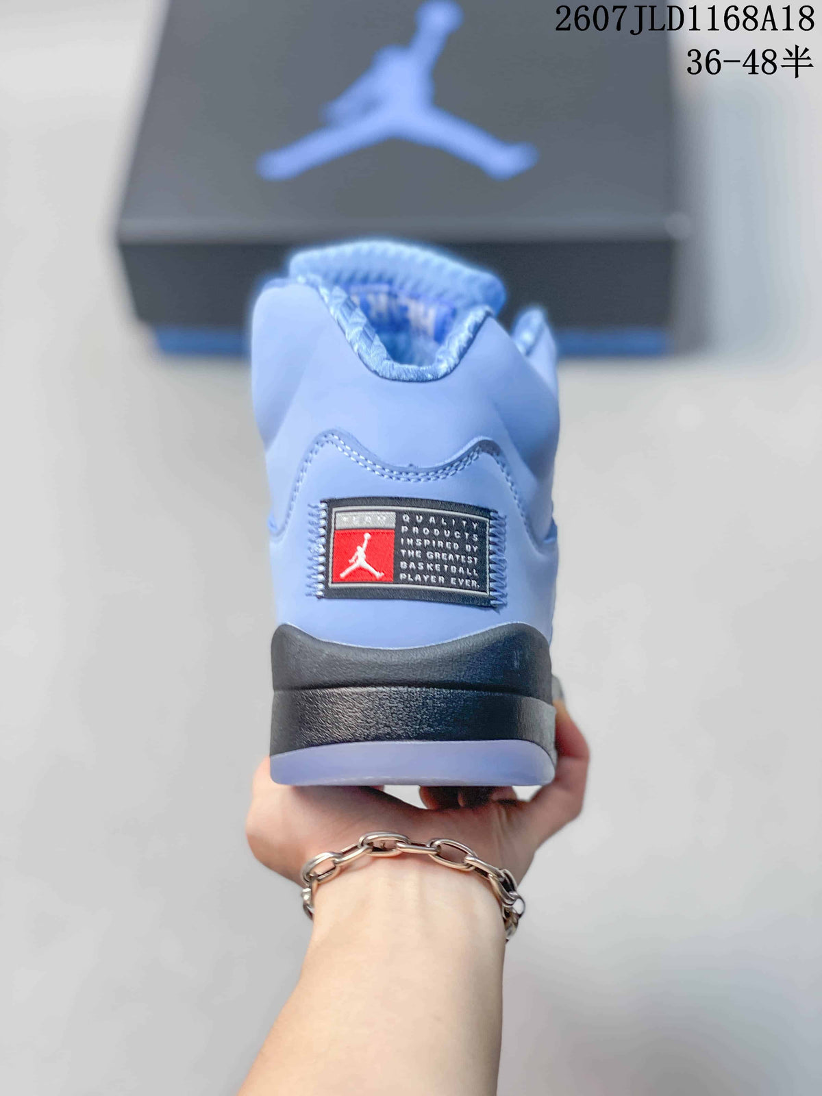Air Jordan 5 UNC High-Top Sneakers in Blue - product image from the listing.