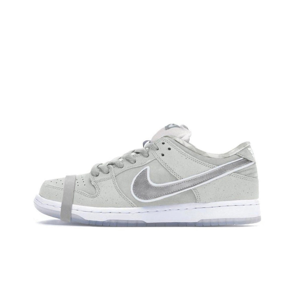 Nike Dunk Low SB Purple Lobster Sneakers in White FD8776-100 - product image from the listing.