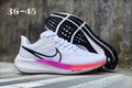 Nike Air Zoom Pegasus 38 Running Shoes in White and Purple - product image from the listing.