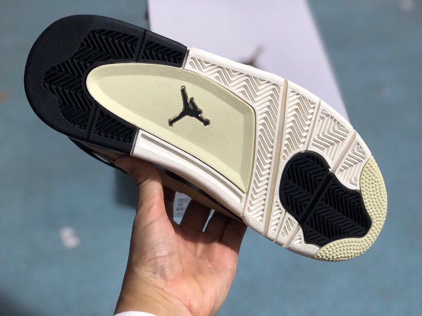 Jordan 4 Retro Sneakers in Tan Black - product image from the listing.