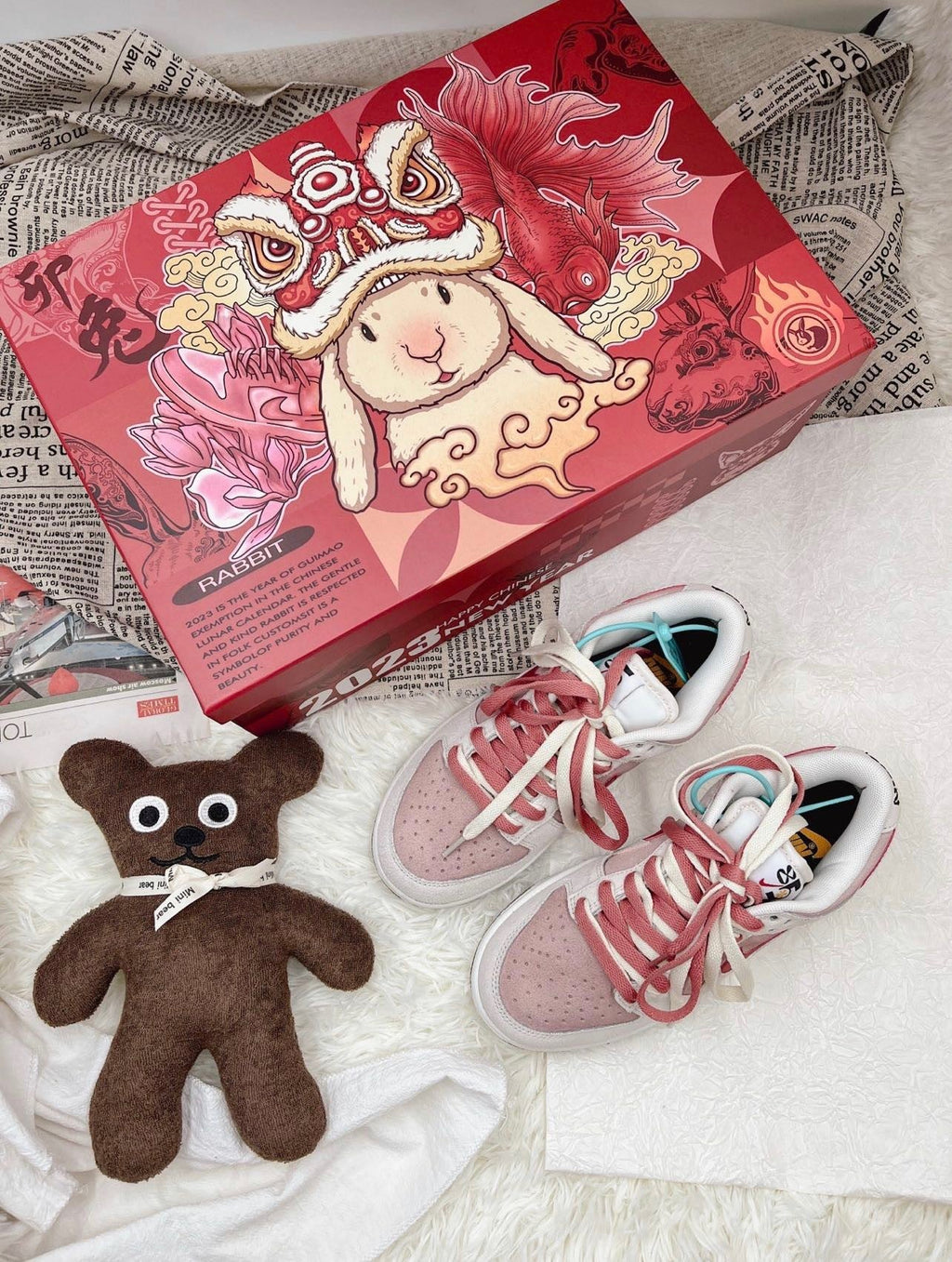 Nike Dunk Low SE Rabbit Year Sneakers in Pink White DO9457-117 - product image from the listing.