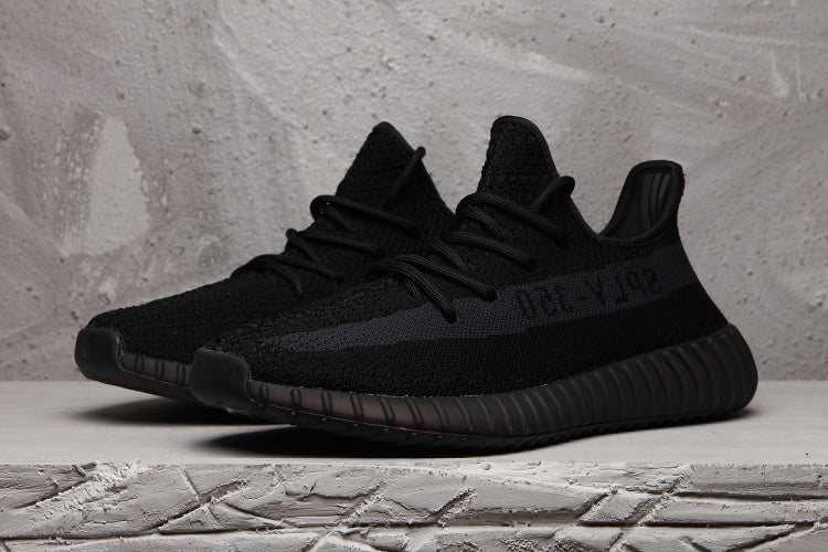 Yeezy Boost 350 V2 Sneakers in Black Knit - product image from the listing.