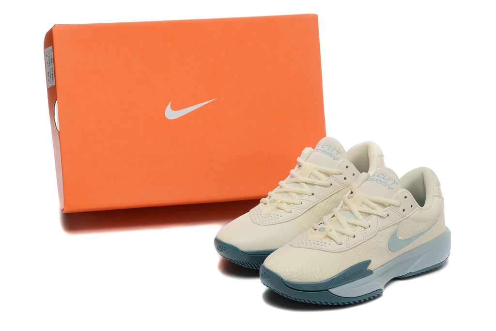 Nike G.T. Cut Academy Basketball Shoes, in Sail and Blue - product image from the listing.