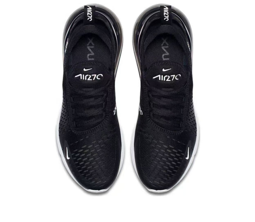 Nike Air Zoom Sneaker in Black and White - product image from the listing.