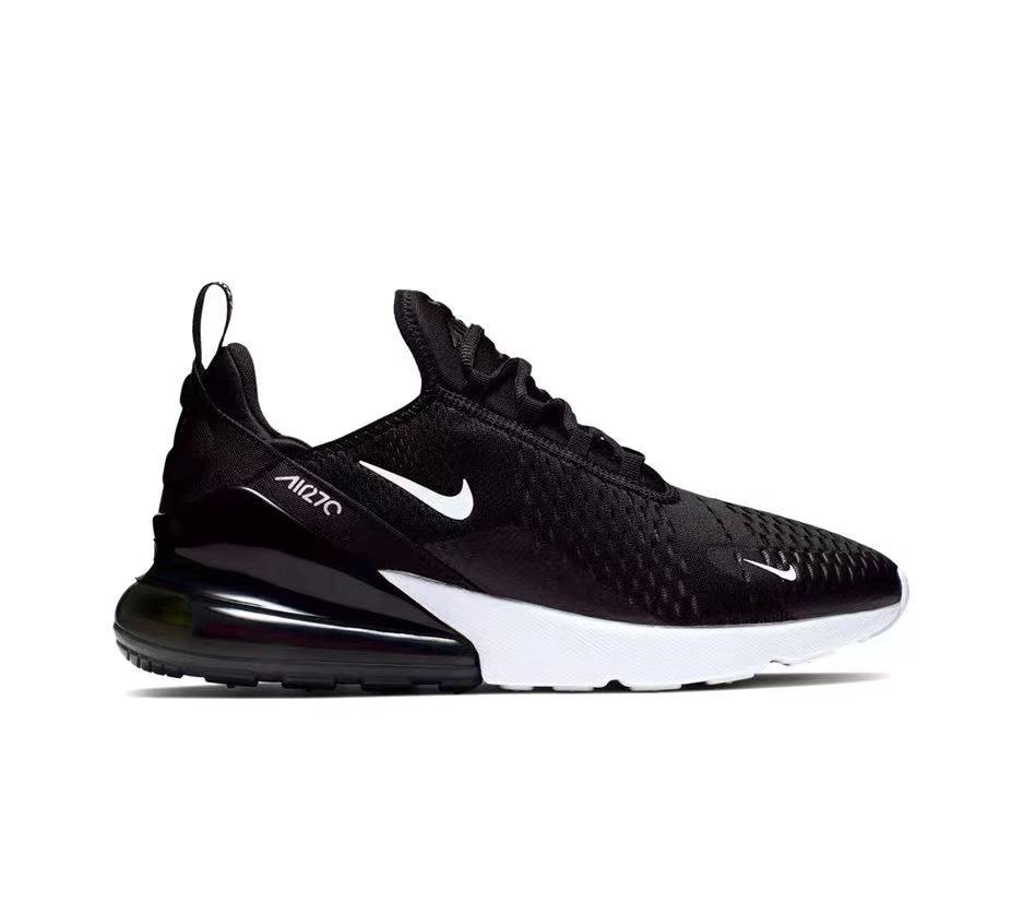 Nike Air Zoom Sneaker in Black and White - product image from the listing.