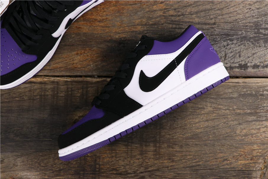 Jordan 1 Low in Black White Purple 553558-125 - product image from the listing.