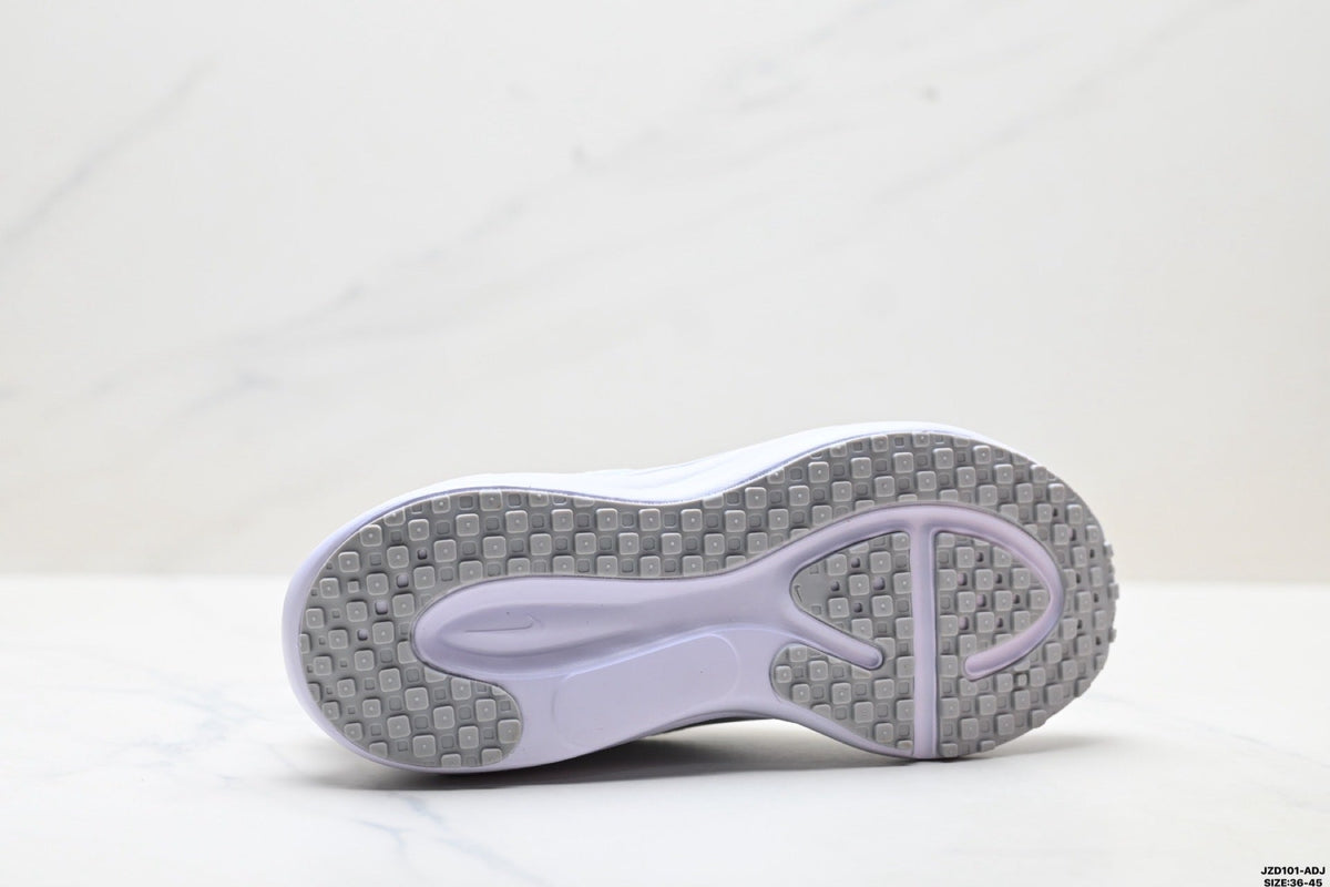 Nike Revolution 8 Running Shoes in White and Light Purple - product image from the listing.