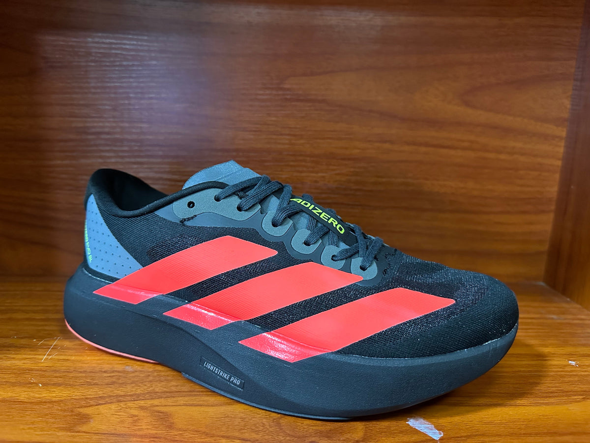 Black and Coral Adidas Adizero Running Shoes - product image from the listing.