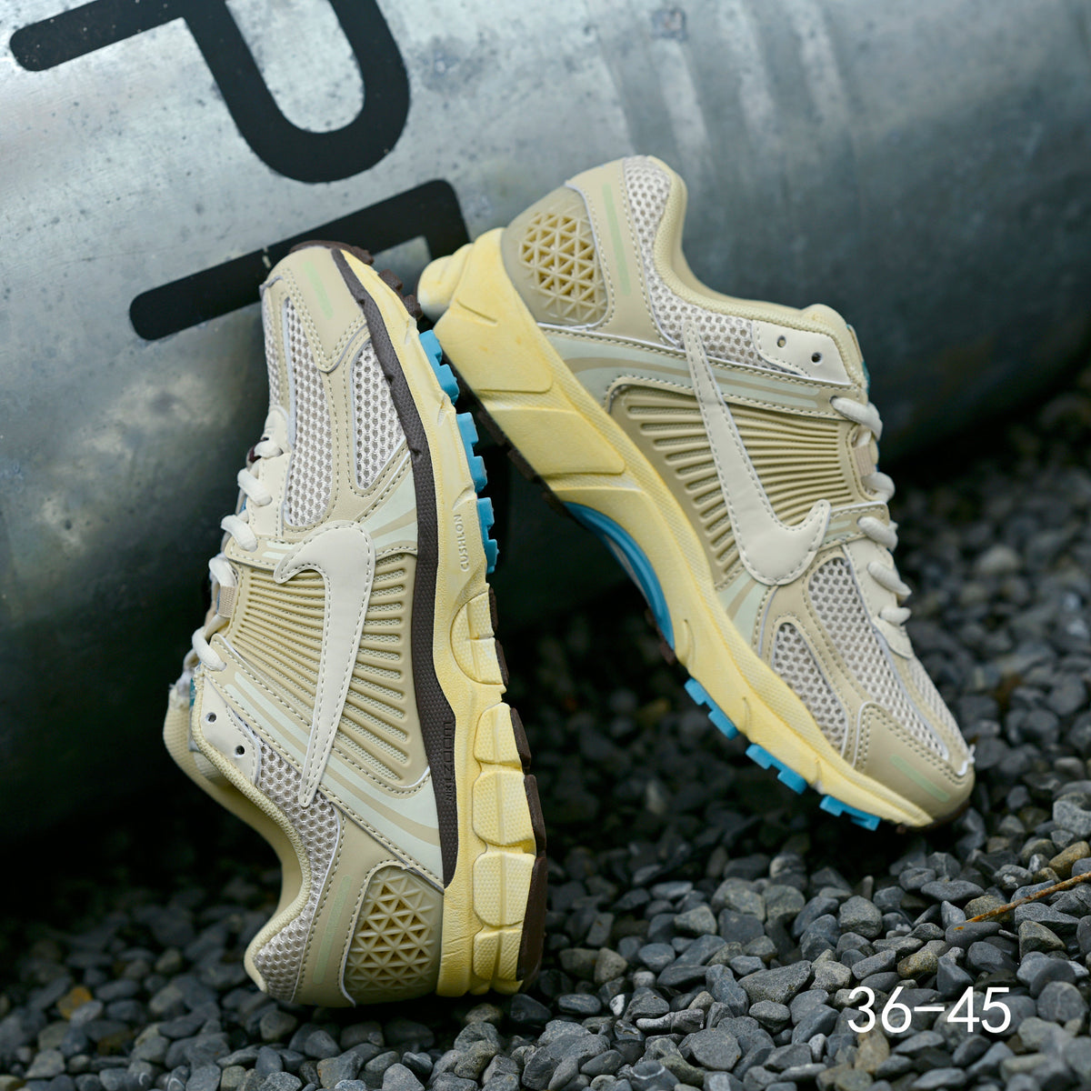 Pale Green and Blue Nike Air Zoom Vomero 5 Sneakers - product image from the listing.