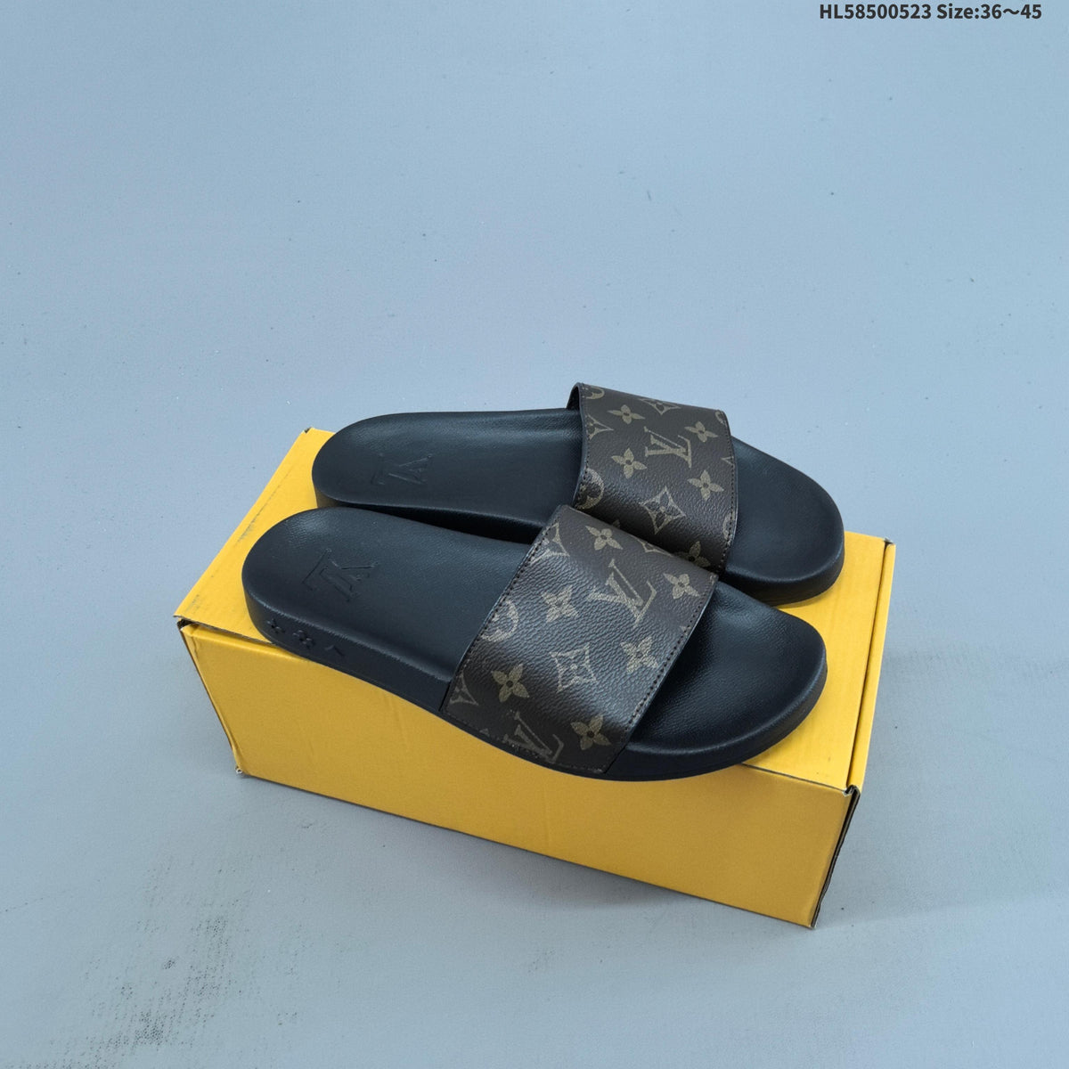 HL58500523 Monogram Slide Sandals by Gucci - product image from the listing.