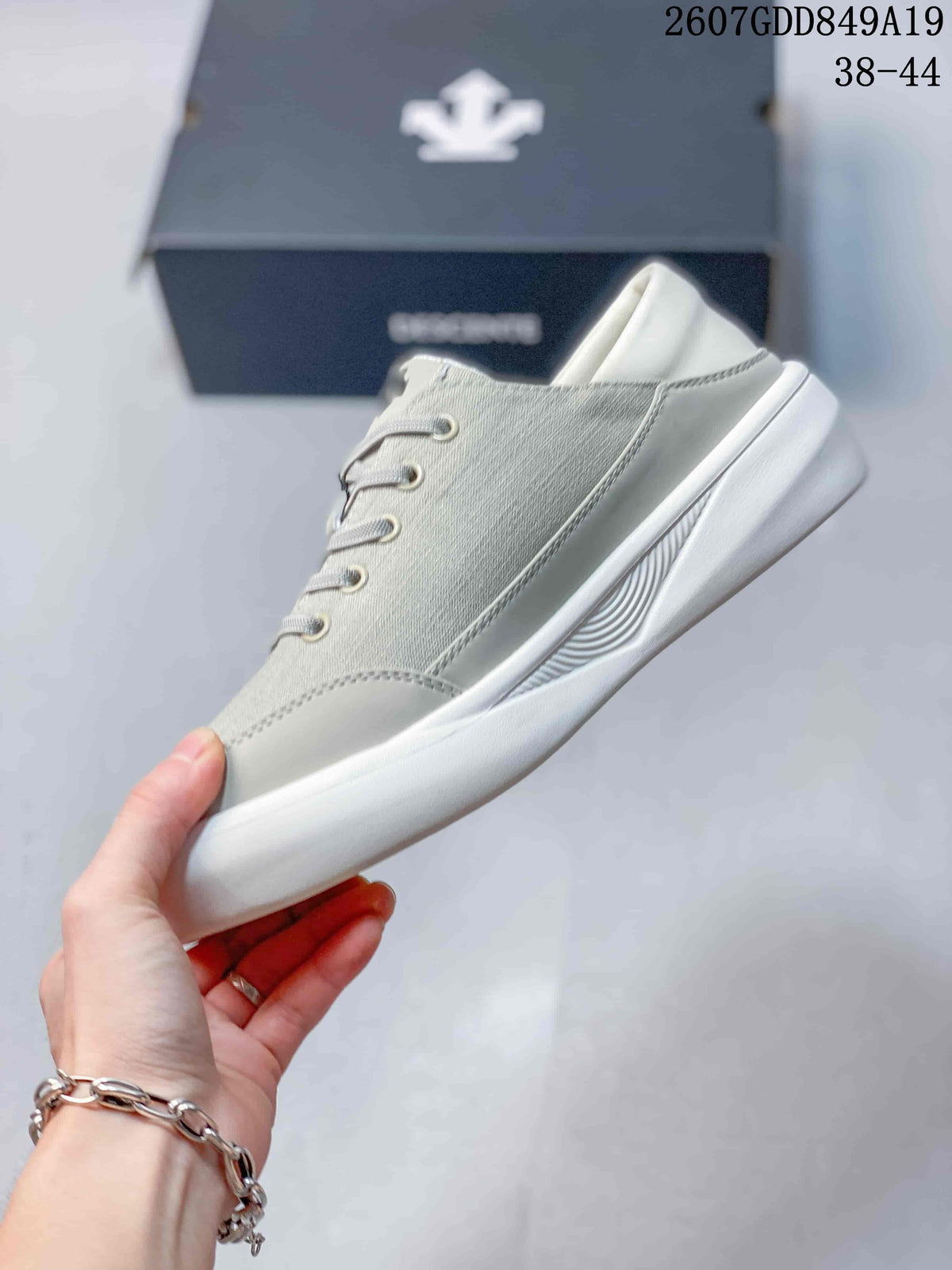 White and Gray Descente 2607GDD849A19 Low-Top Sneakers - product image from the listing.