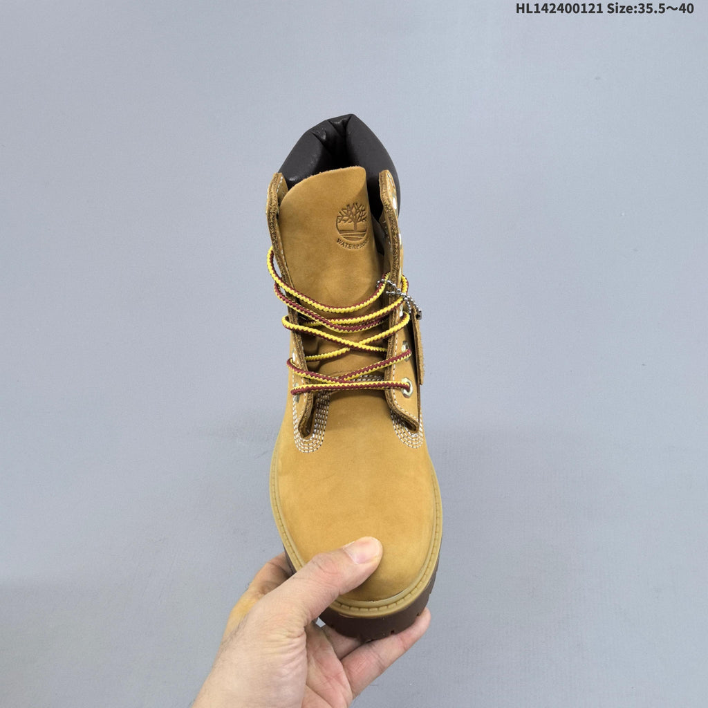 Mid-Top Lace-Up Boots in Wheat by Timberland - product image from the listing.