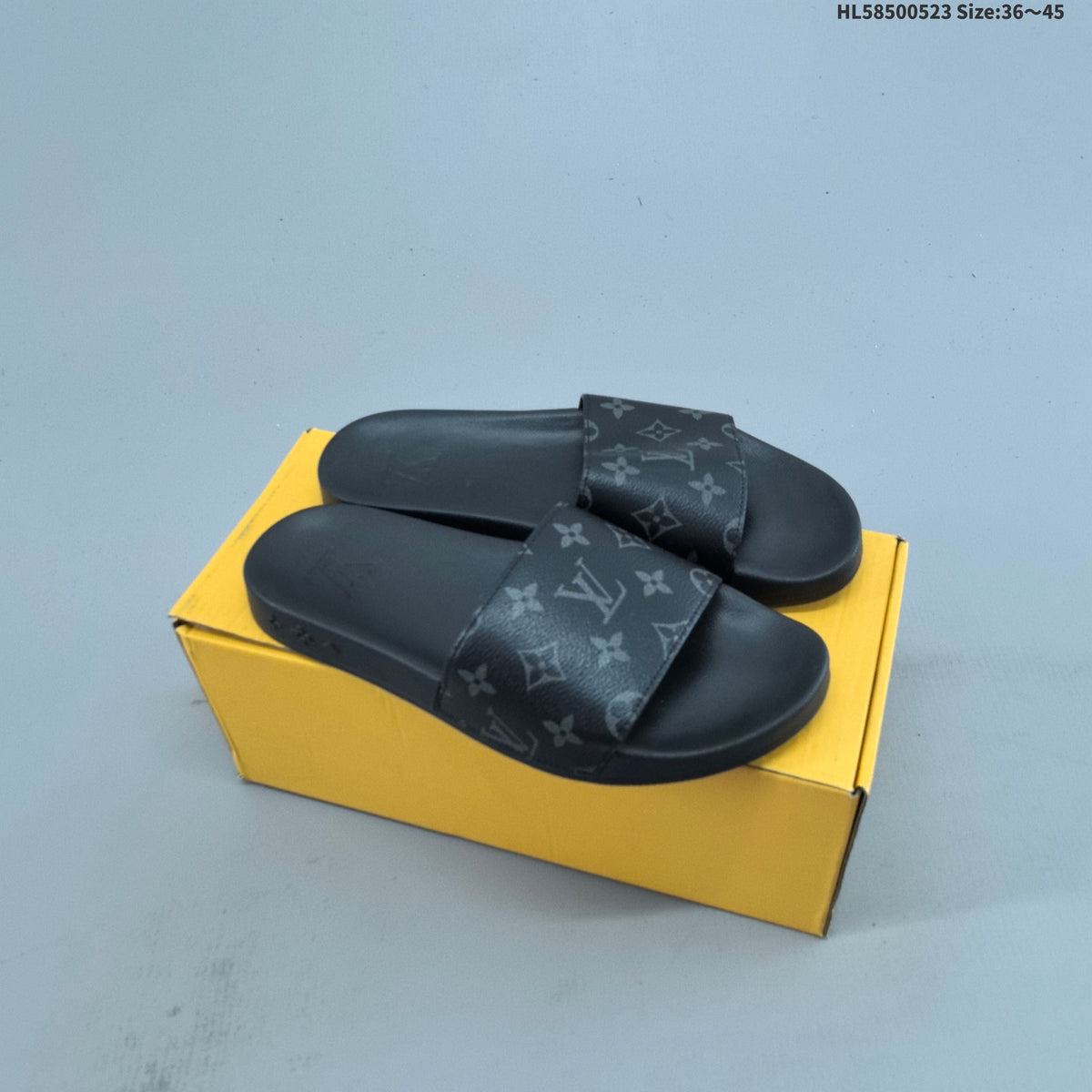 HL58500523 Monogram Slide Sandals by Gucci - product image from the listing.