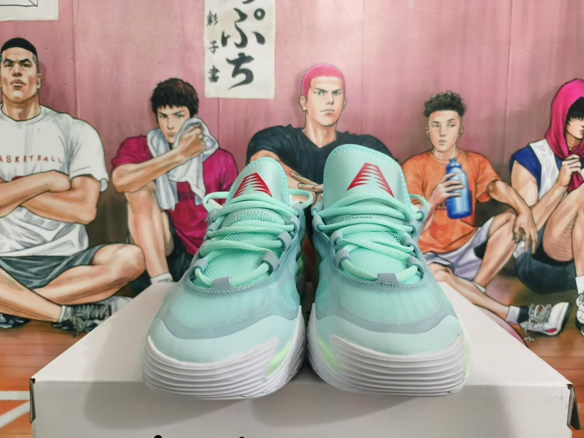 Mint Green and White Basketball Sneakers - product image from the listing.