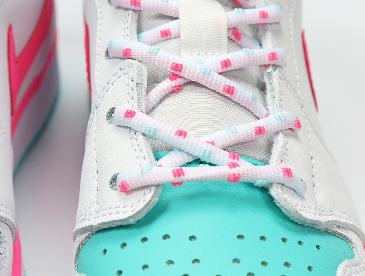 Jordan 1 Mid Sneakers in White Pink Aqua 555112-102 - product image from the listing.