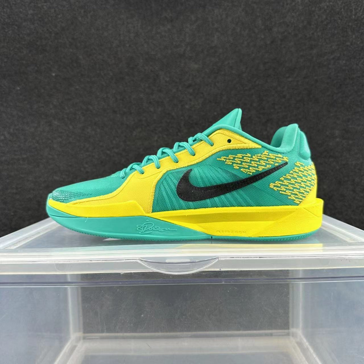 Nike Basketball Shoes in Turquoise, in Yellow and Black - product image from the listing.