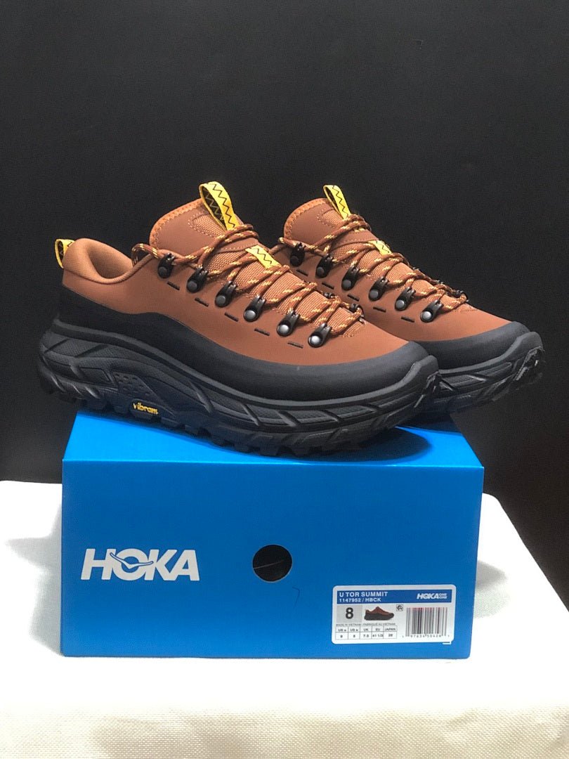 Brown and Black HOKA Tor Summit Hiking Shoes - product image from the listing.