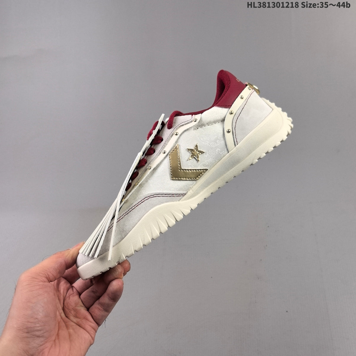 Converse 1970 Low-Top Sneakers in White Burgundy Gold - product image from the listing.
