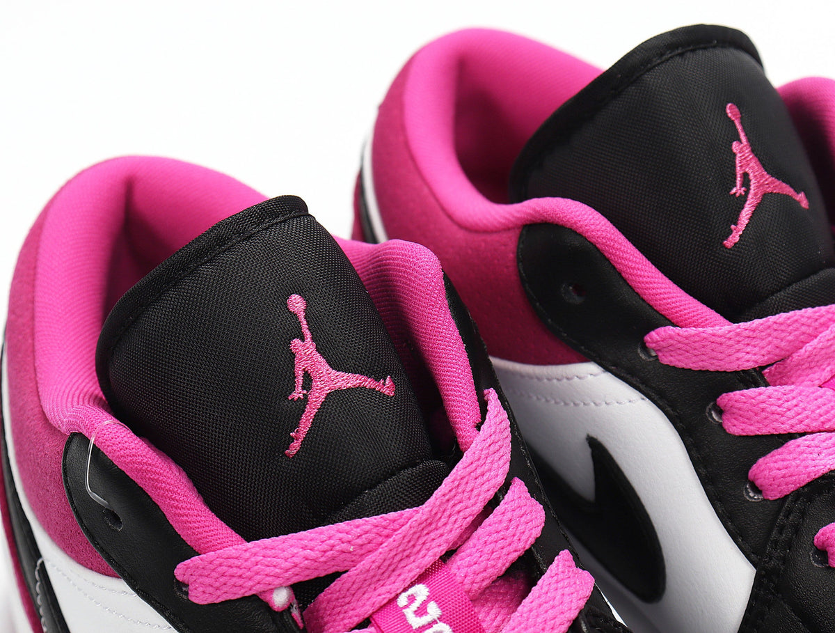 Jordan 1 Low Raspberry Sneakers in Pink Black White CK3022-005 - product image from the listing.