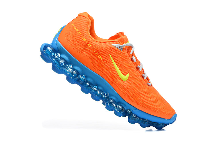Nike Air Max Plus Sneakers in Orange and Blue - product image from the listing.