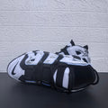 Nike Air More Uptempo Panda Sneakers in Black and White - product image from the listing.