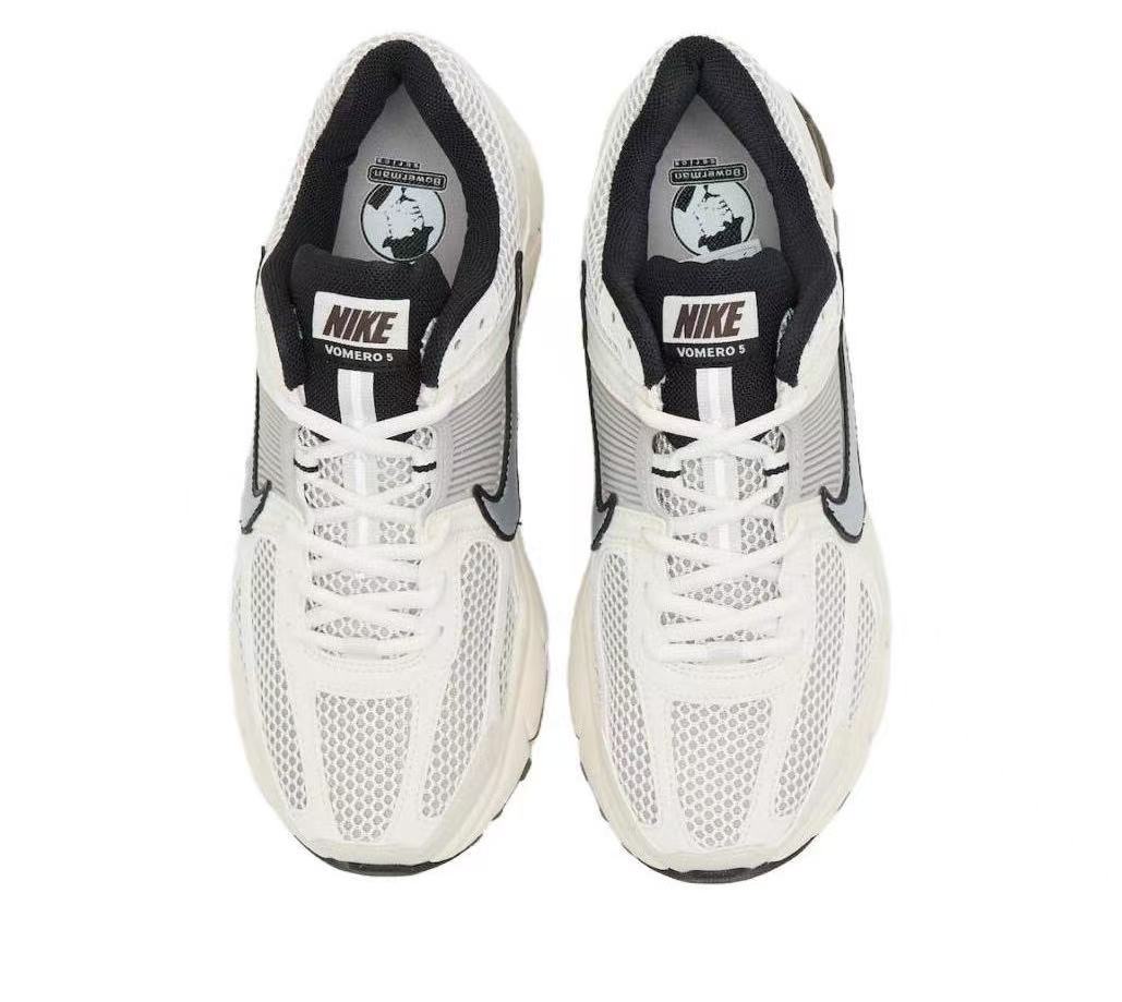 Metallic Silver and White Nike Vomero 5 Sneakers - product image from the listing.