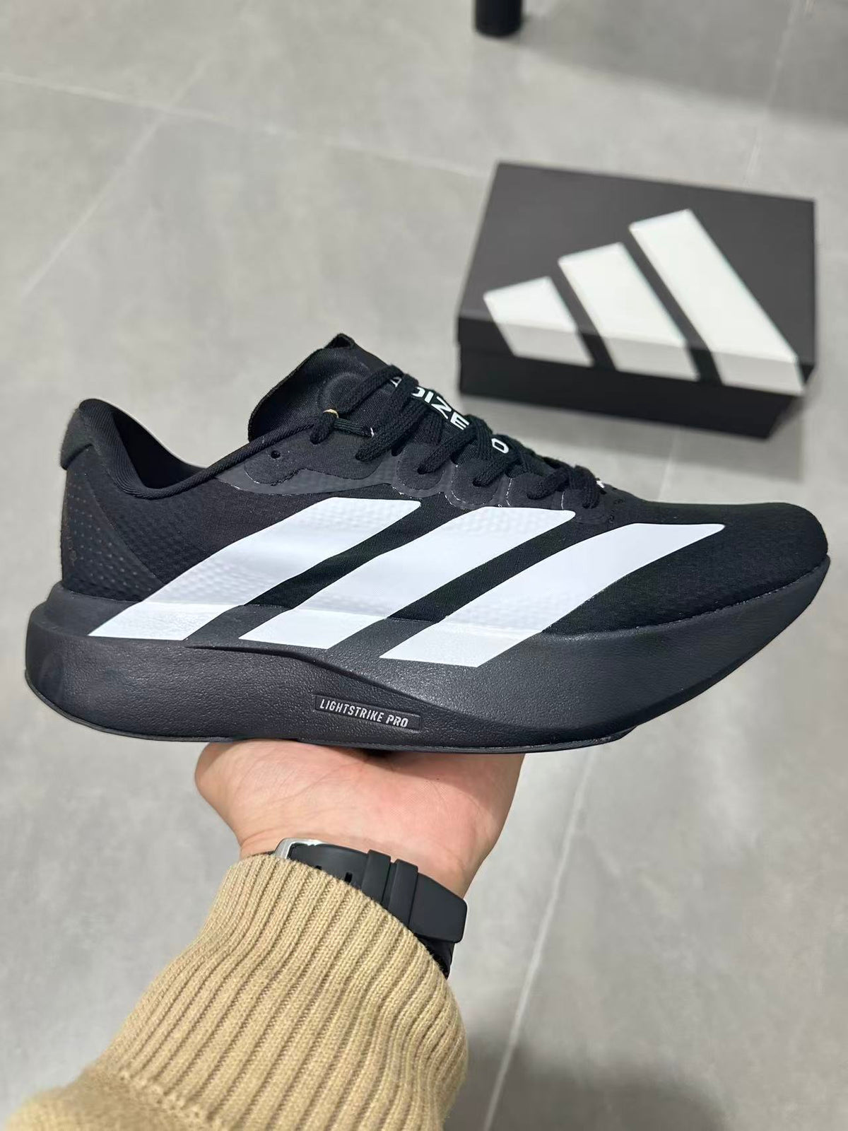 Adidas Lightstrike Pro Running Shoes in Black White KJ3595 - product image from the listing.