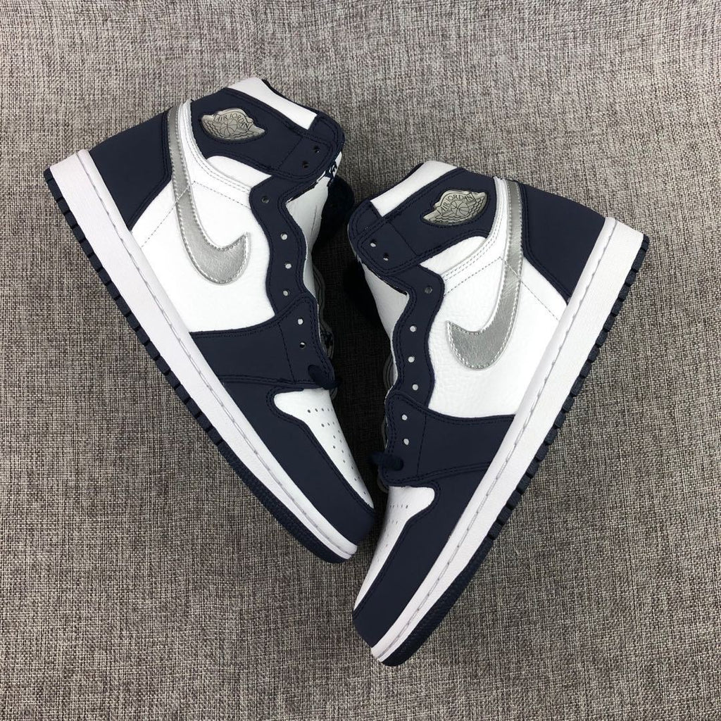 Air Jordan 1 Co.JP High Sneakers White Navy Silver DC1788-100 - product image from the listing.