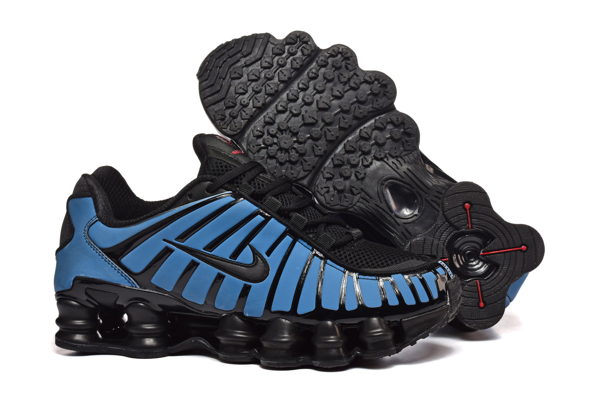 Black and Pink Nike Shox TL Sneakers - product image from the listing.