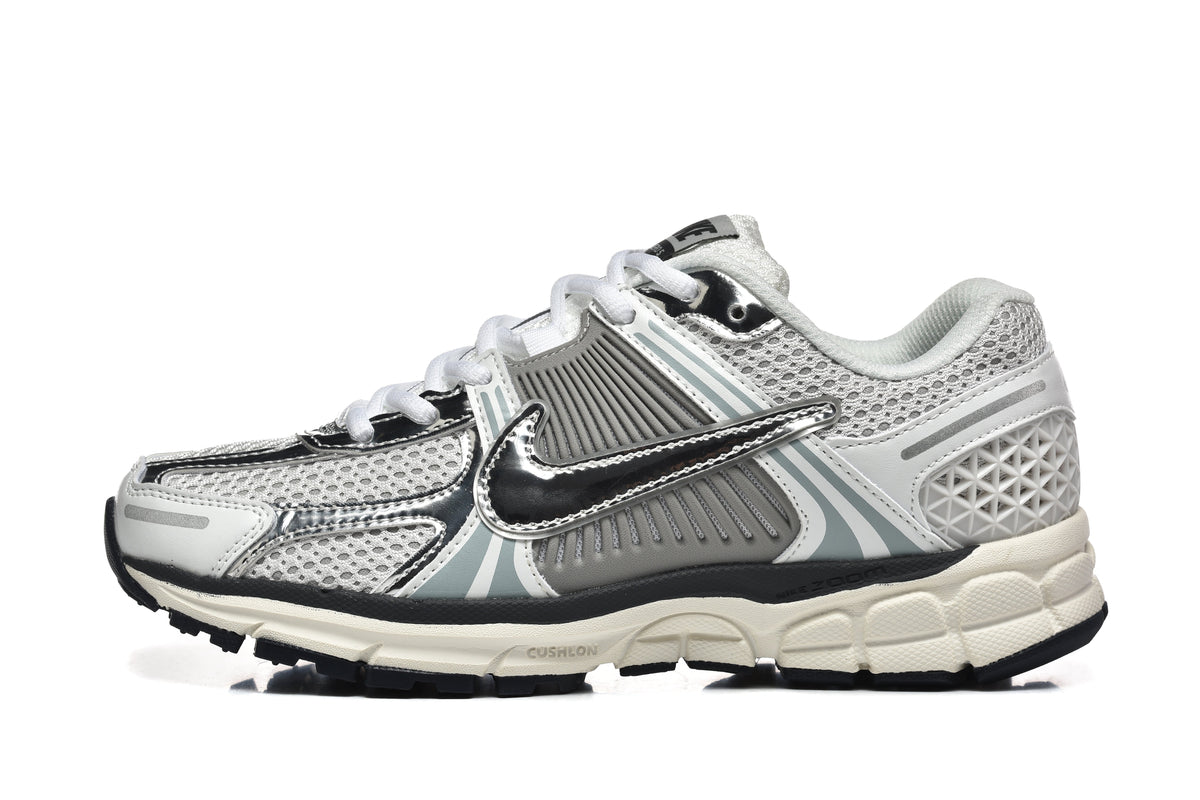 Nike Vomero 5 Sneakers in Silver and White - product image from the listing.