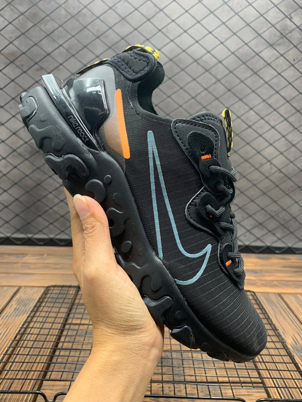 Nike React Vision Black Orange Blue Grid Trainers - product image from the listing.