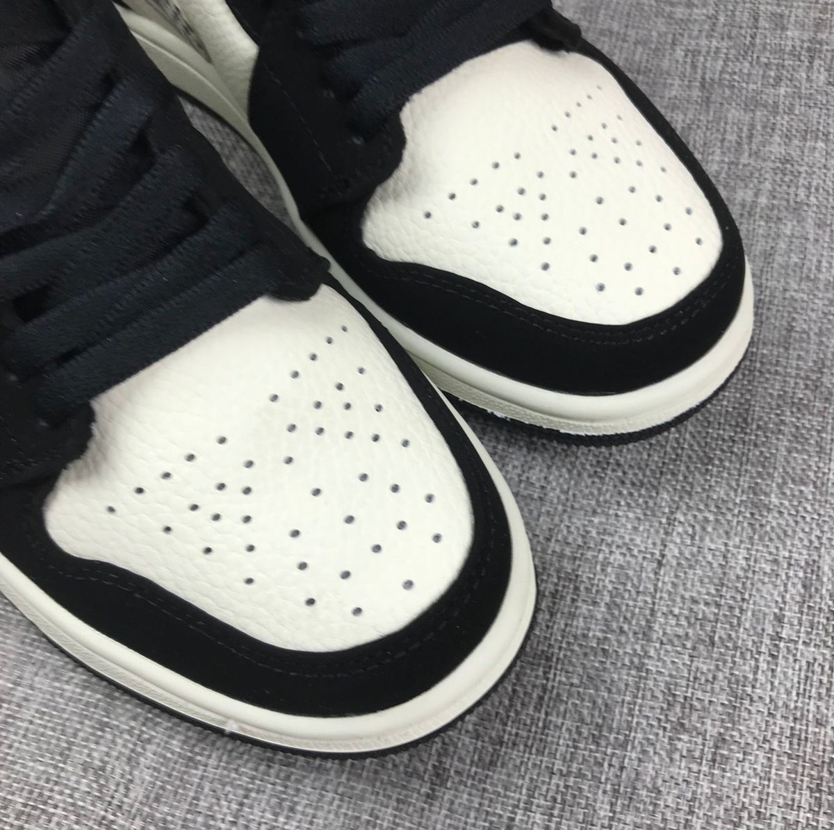 Black History Month Sneakers - Air Jordan 1 Mid 852542-010 - product image from the listing.