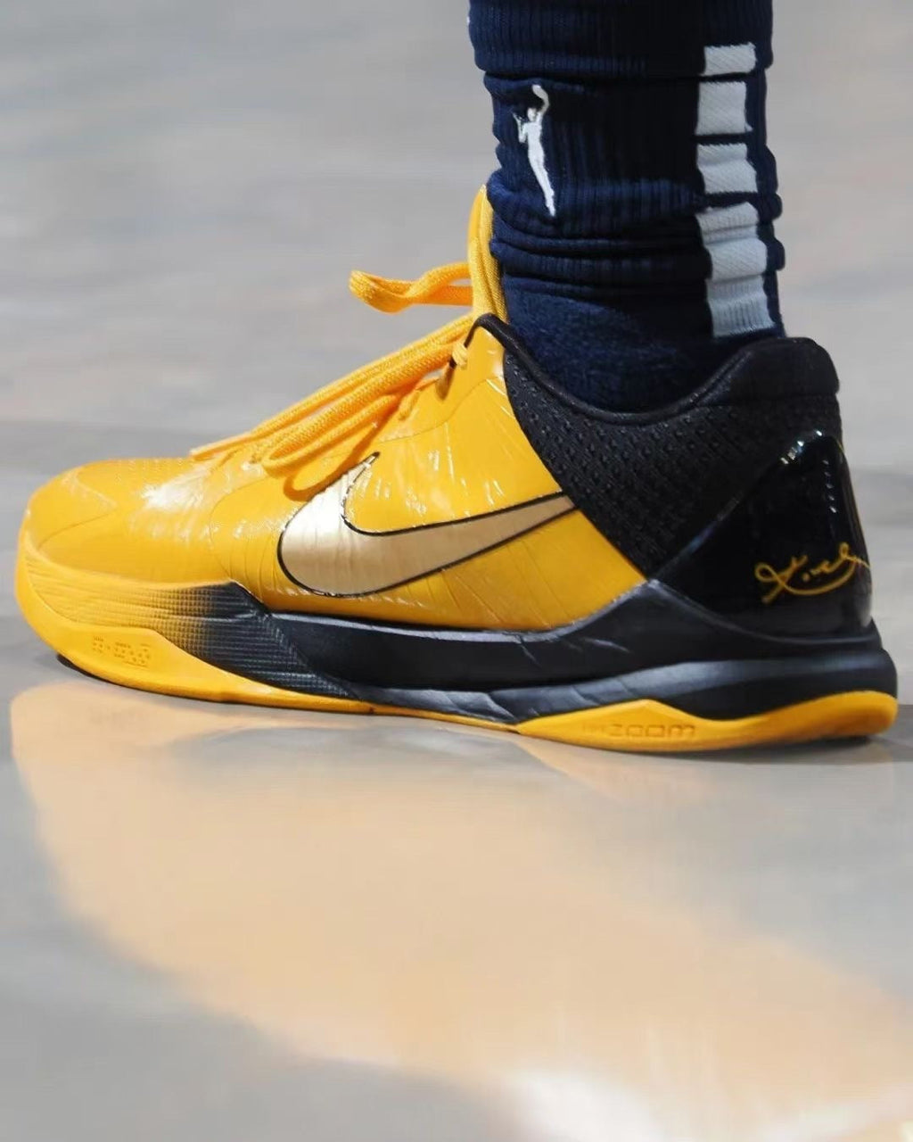 Yellow and Black Nike Kobe 5 Basketball Shoes - product image from the listing.