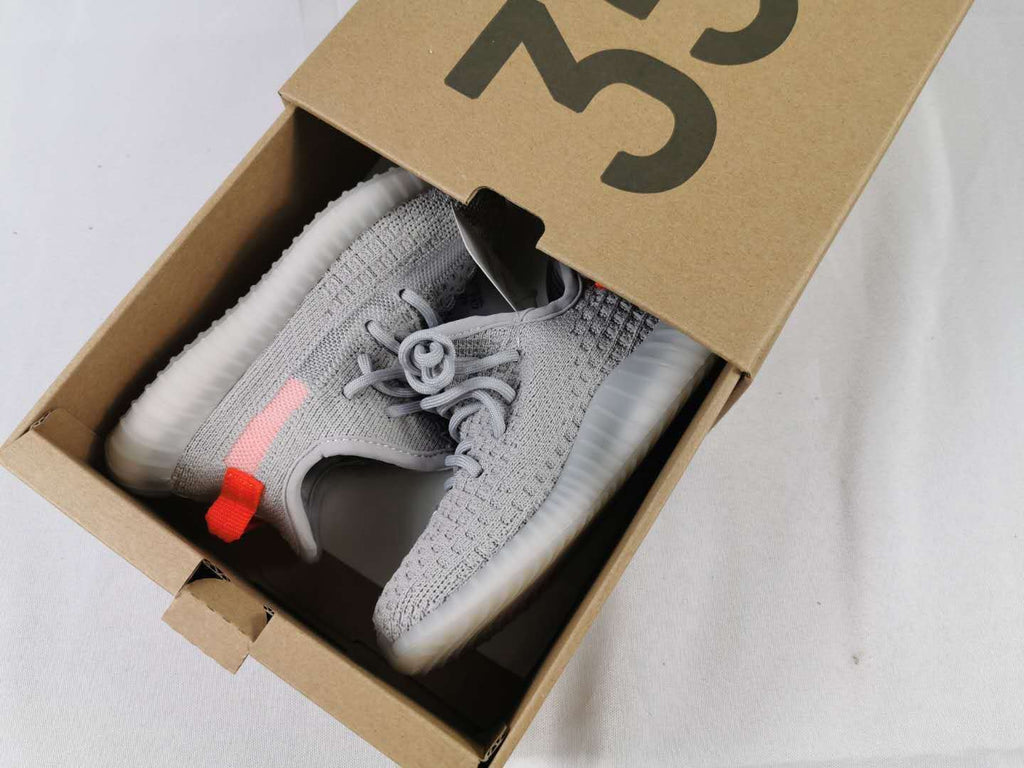 Light Grey and Coral Yeezy 350 V2 Kids Sneakers - product image from the listing.