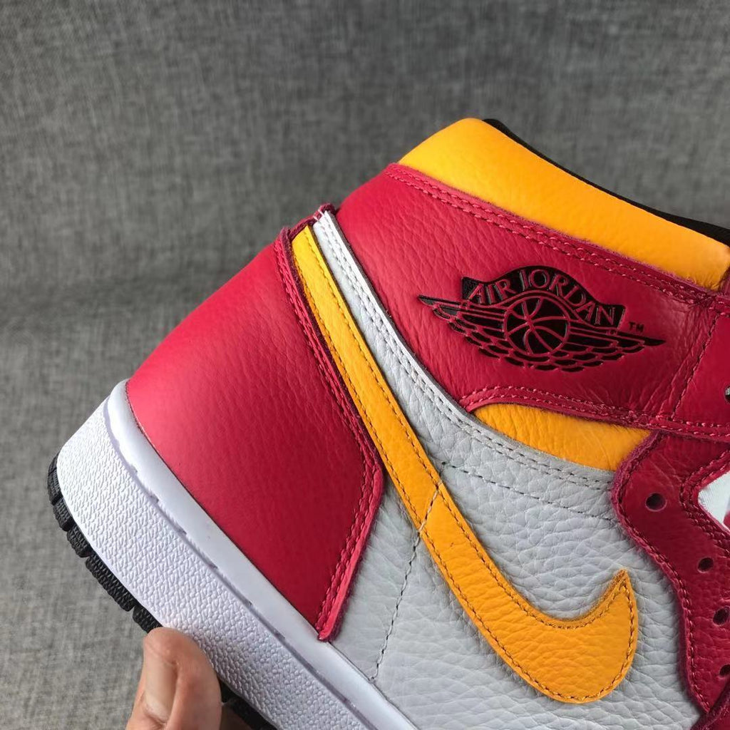 Air Jordan 1 High OG Light Fusion Red Sneakers 555088-603 - product image from the listing.