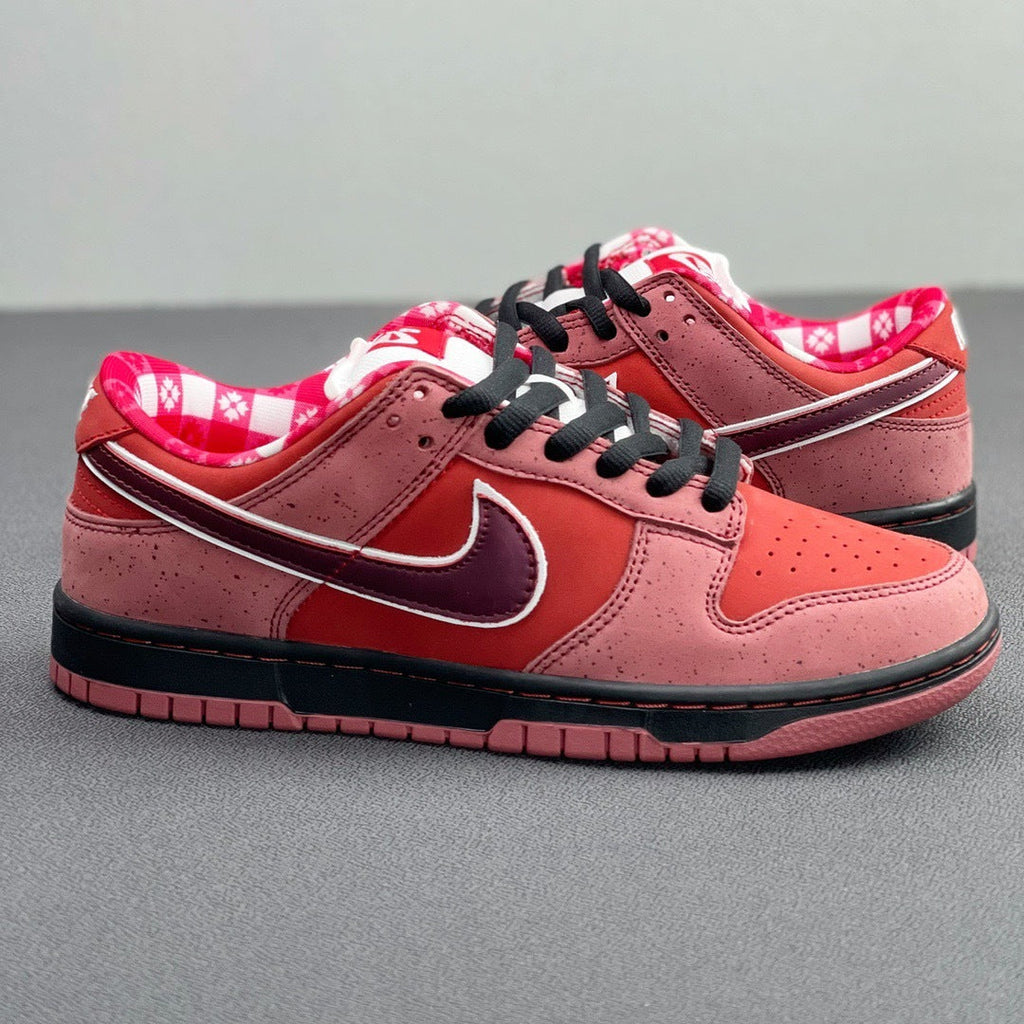 SB Dunk Low Concepts Red Lobster 313170-661 by Nike - product image from the listing.