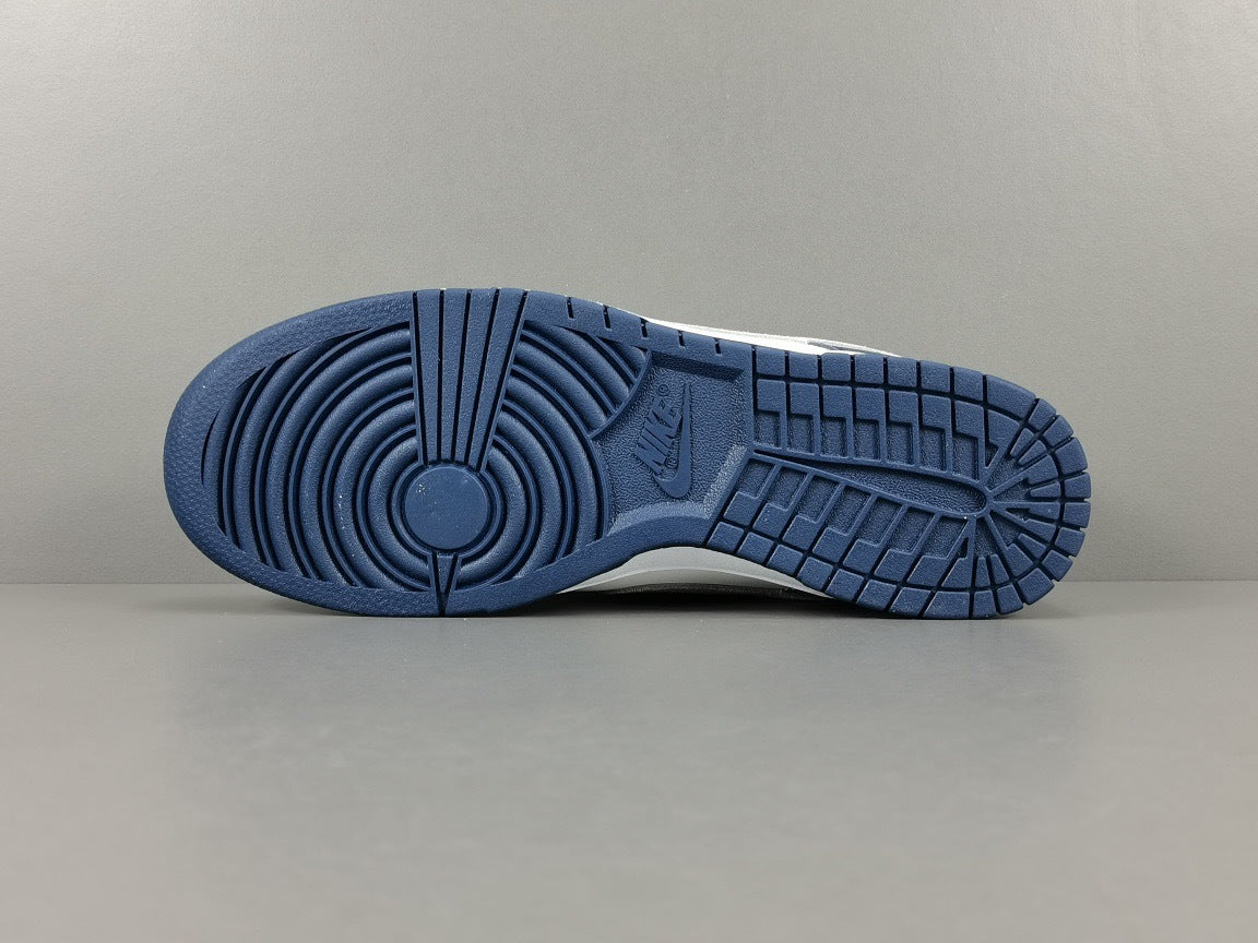 Nike Dunk Low Sneakers in Midnight Navy FD9749-400 - product image from the listing.
