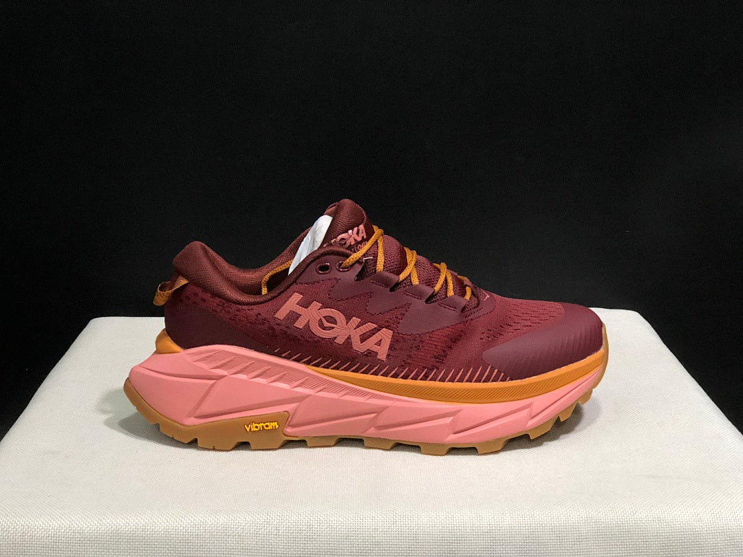 Burgundy and Pink HOKA Skyline Float X Trail Sneakers - product image from the listing.