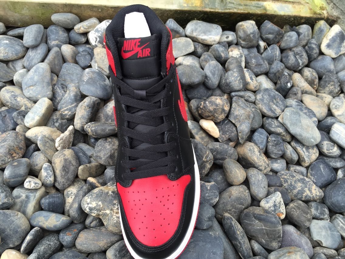 Air Jordan 1 High Sneakers in Black Red White - product image from the listing.