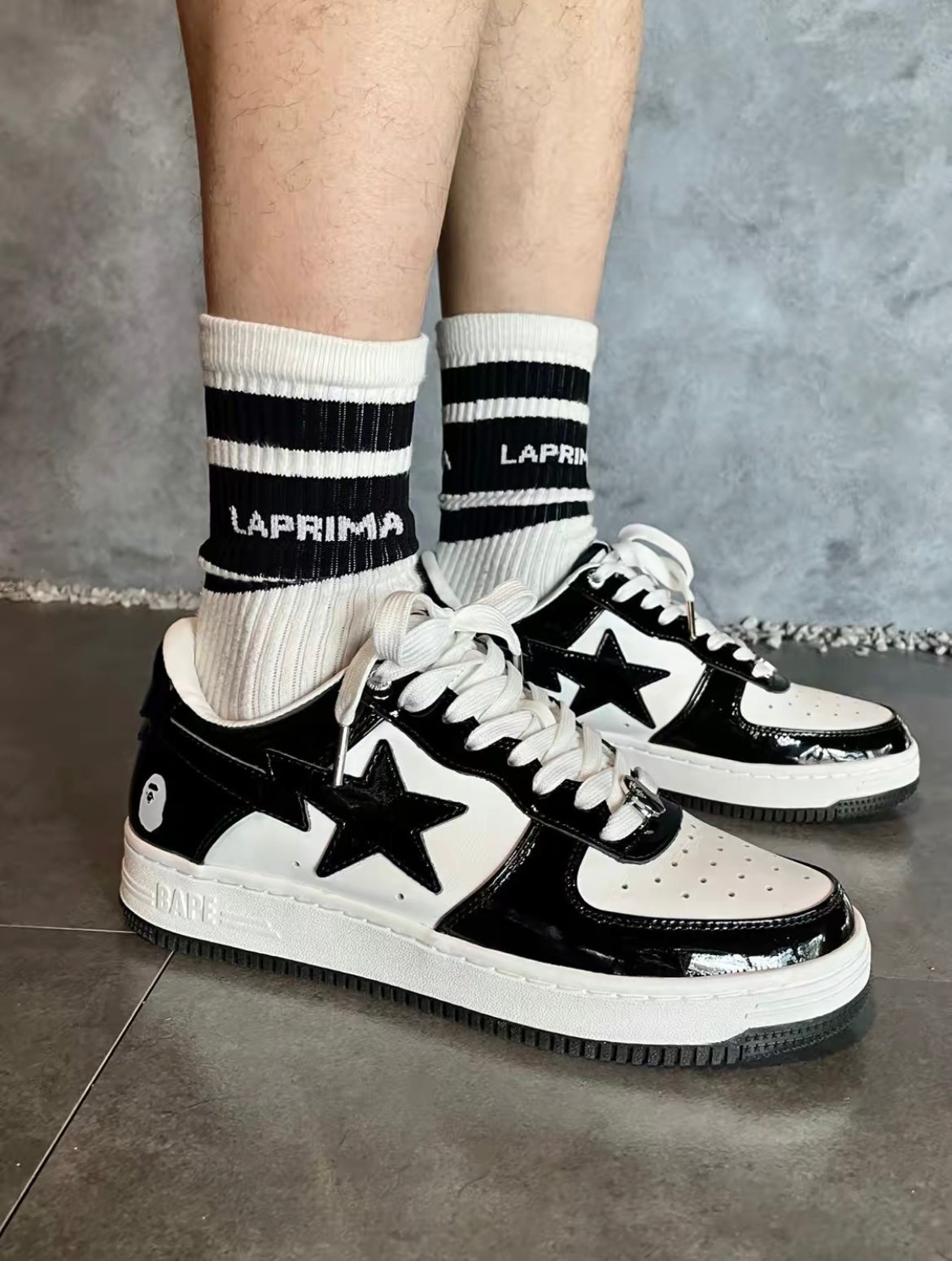 BAPE STA Low Sneakers in Black and White 1H70-191-001 - product image from the listing.
