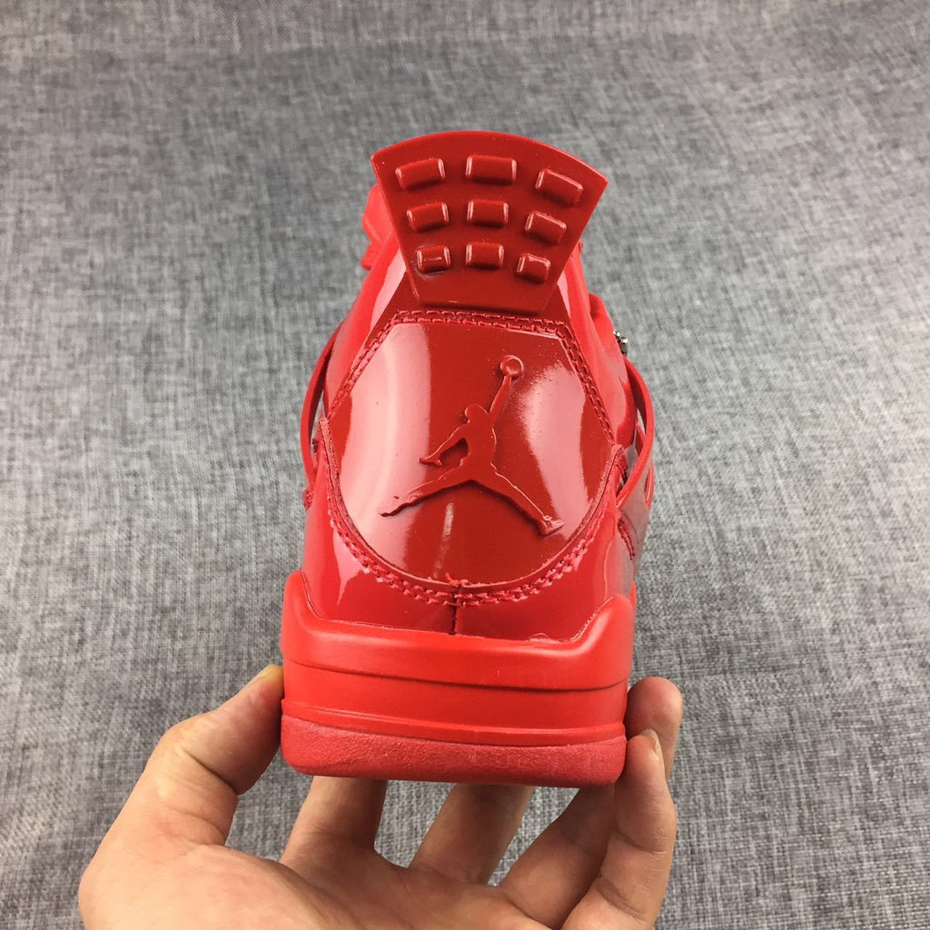 Air Jordan 4 Red Patent Leather Sneakers - product image from the listing.