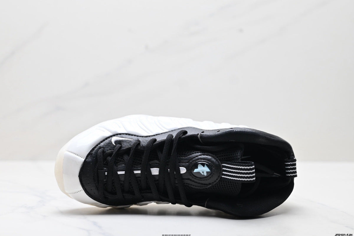 Nike Air Foamposite One Penny Sneakers in White and Black - product image from the listing.