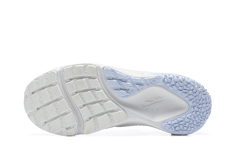 White and Pale Blue Nike Air Huarache Run Sneakers - product image from the listing.