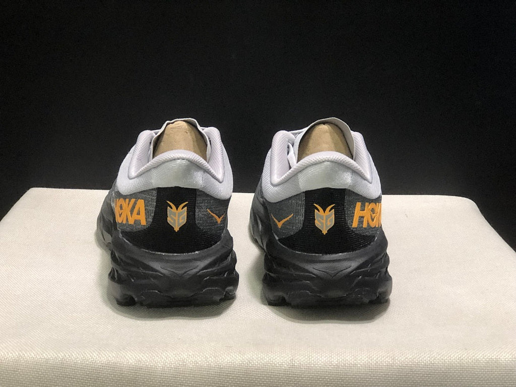 HOKA Speedgoat 5 Trail Running Shoes in White Gray - product image from the listing.