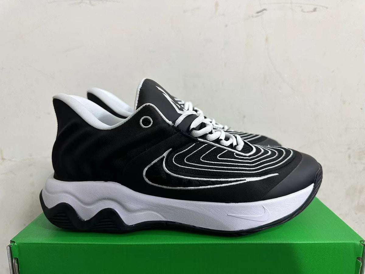 Nike Basketball Sneakers in Black and White - product image from the listing.