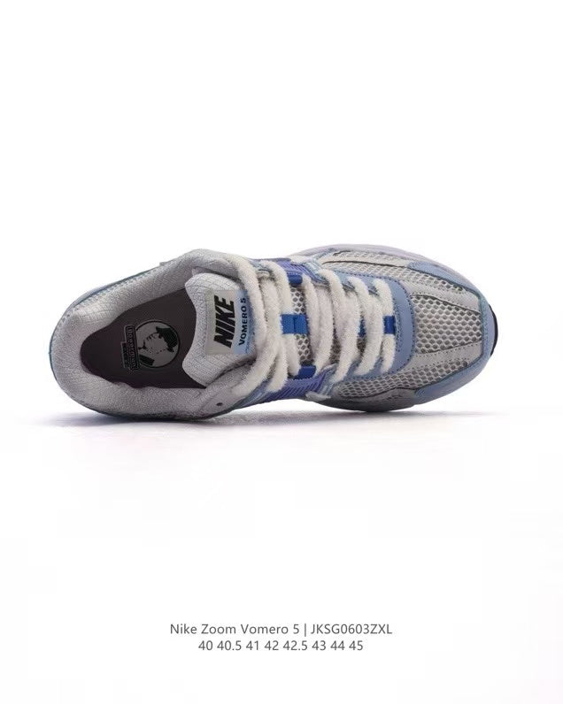 Nike Zoom Vomero 5 Sneakers in Light Blue JKG603ZXL - product image from the listing.
