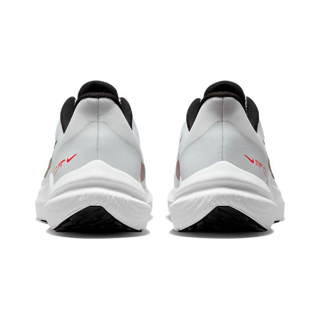 Nike Air Winflo 9 Running Shoes in White and Pink DD6203-009 - product image from the listing.