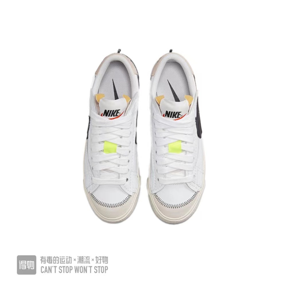 Nike Blazer Low 77 Sneakers in White Black - product image from the listing.