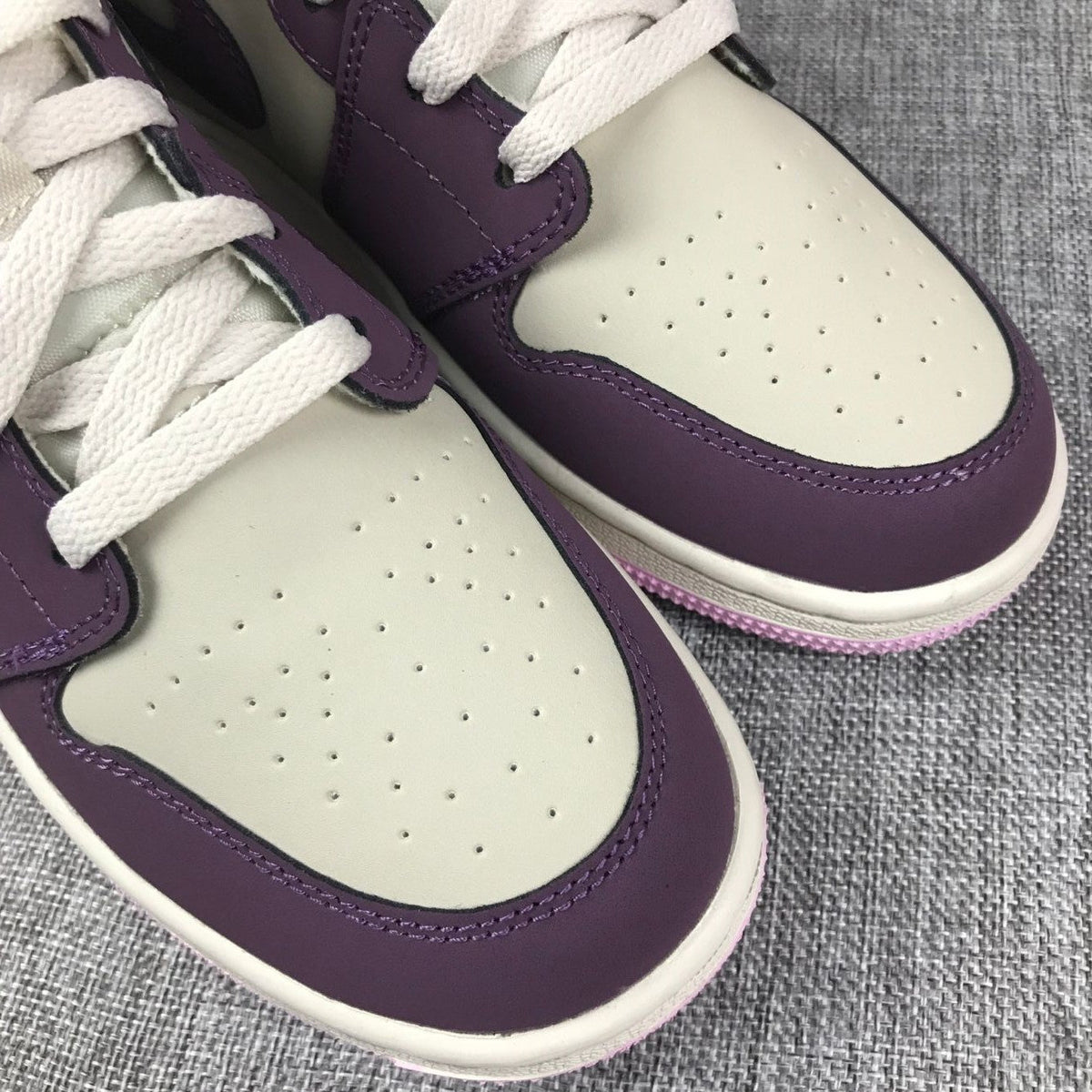 Air Jordan 1 Mid GS Sneakers in White Purple Pink - product image from the listing.