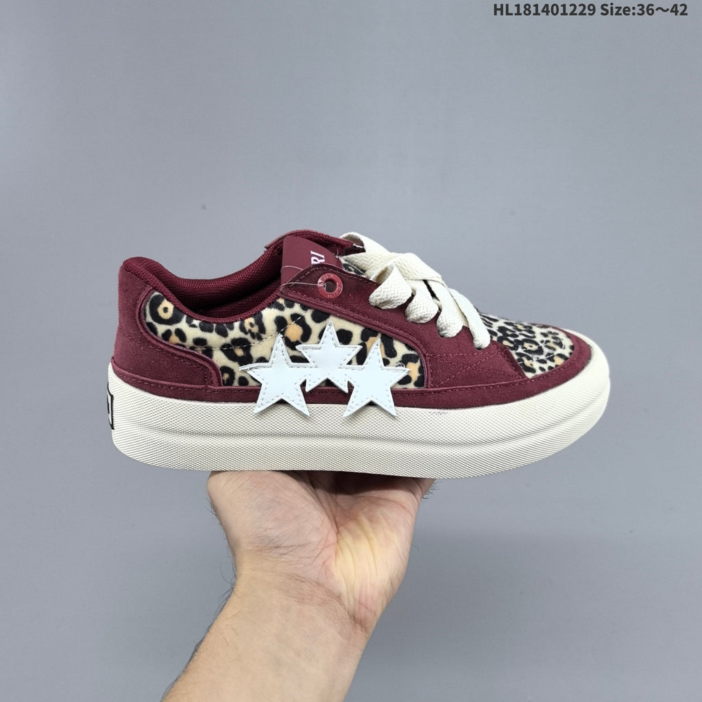 AMIRI Star Low-Cut Sneakers with Leopard Print Details - product image from the listing.